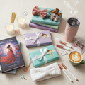 Trendy mystery book bundle flat lay with books, tumblers, hair accessories, lip gloss, spa items, candles and stickers